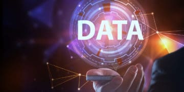 Businessman hand holding cellphone with abstract data interface. Future and innovation concept. 3D Rendereing