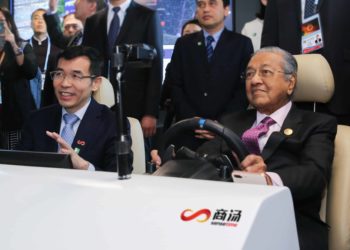 In this undated photo, Malaysian Prime Minister Dr. Mahathir Mohamad (right) was welcomed by SenseTime Founder Prof. Xiao'ou Tang (left) at the SenseTime office in Beijing. PHOTO from SenseTime