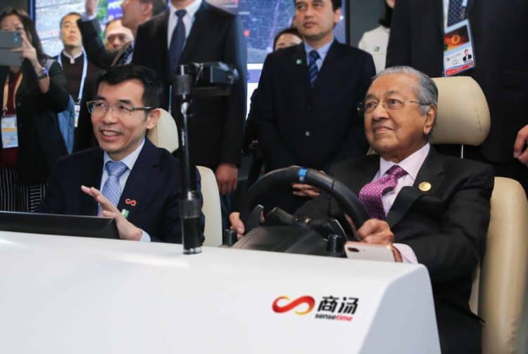 In this undated photo, Malaysian Prime Minister Dr. Mahathir Mohamad (right) was welcomed by SenseTime Founder Prof. Xiao'ou Tang (left) at the SenseTime office in Beijing. PHOTO from SenseTime