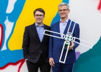 Myriota's Alex Grant with Optus Business managing director Chris Mitchell at Lot Fourteen in Adelaide, South Australia. (Photo: Rosina Possingham)