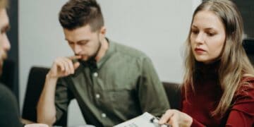 Photo by cottonbro: https://www.pexels.com/photo/man-and-woman-sitting-beside-table-3205567/