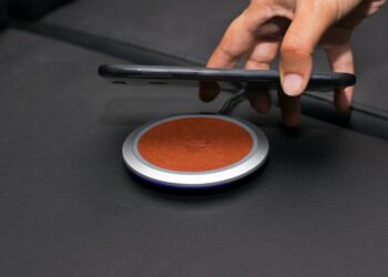 Photo by Rann Vijay: https://www.pexels.com/photo/close-up-of-person-putting-smartphone-on-wireless-charger-7952558/