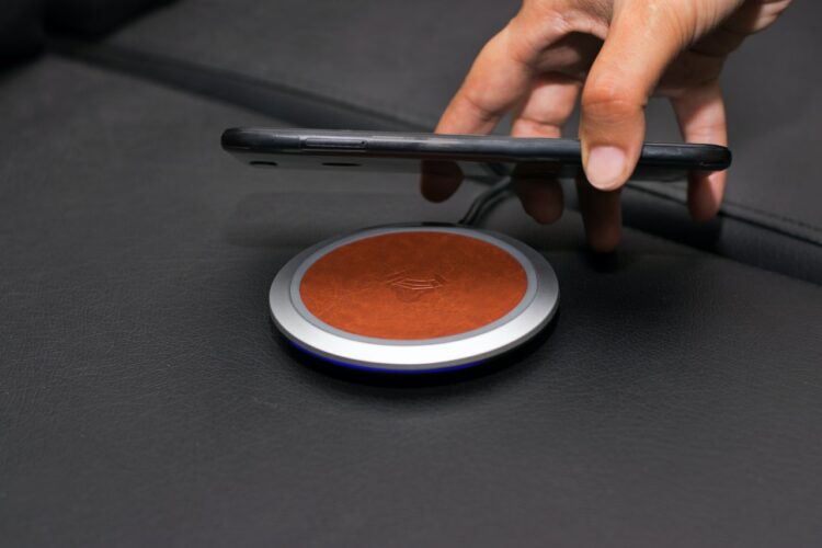 Photo by Rann Vijay: https://www.pexels.com/photo/close-up-of-person-putting-smartphone-on-wireless-charger-7952558/