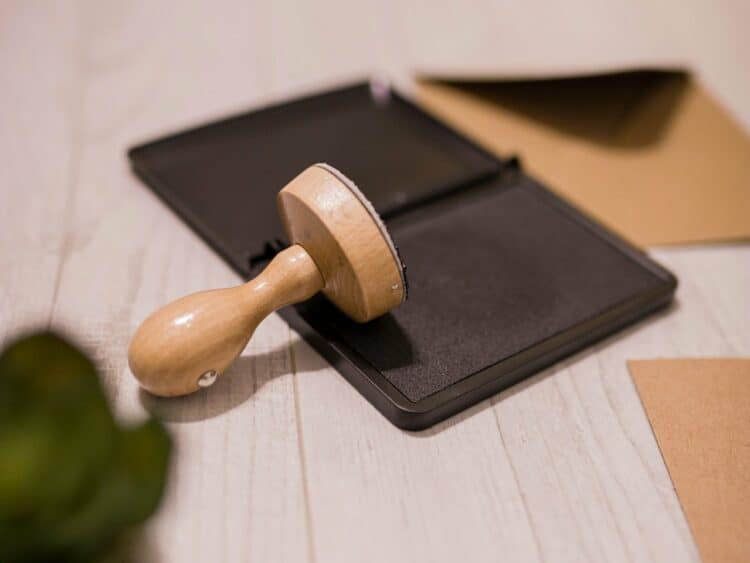 Photo by Dominika Roseclay: https://www.pexels.com/photo/wooden-stamp-on-ink-pad-placed-on-desk-3839649/