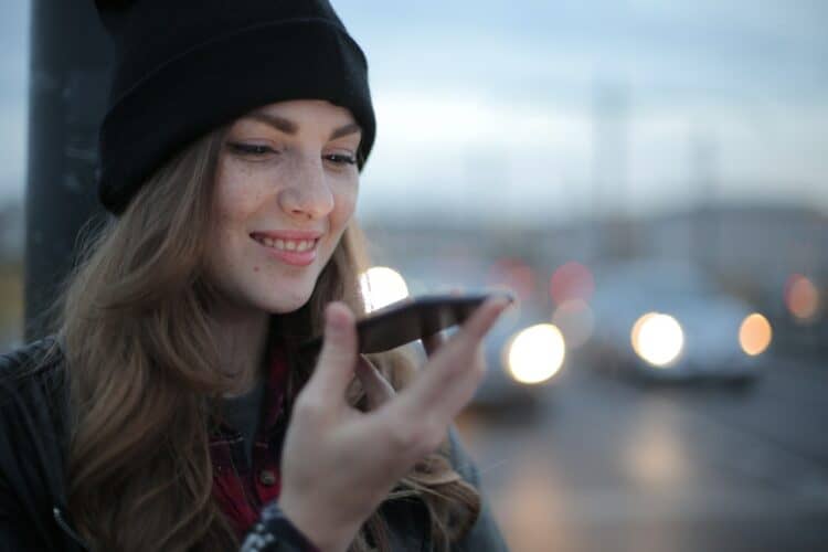 Photo by Andrea Piacquadio: https://www.pexels.com/photo/joyful-young-woman-phoning-on-street-in-evening-3776659/