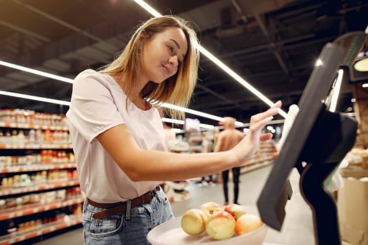 Photo by Gustavo Fring: https://www.pexels.com/photo/cheerful-woman-using-electronic-scales-in-supermarket-4173320/