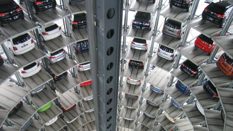 Photo by Pixabay: https://www.pexels.com/photo/vehicles-parked-inside-elevated-parking-lot-63294/