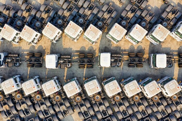 Photo by Tom Fisk: https://www.pexels.com/photo/aerial-photography-of-parked-trucks-3245123/