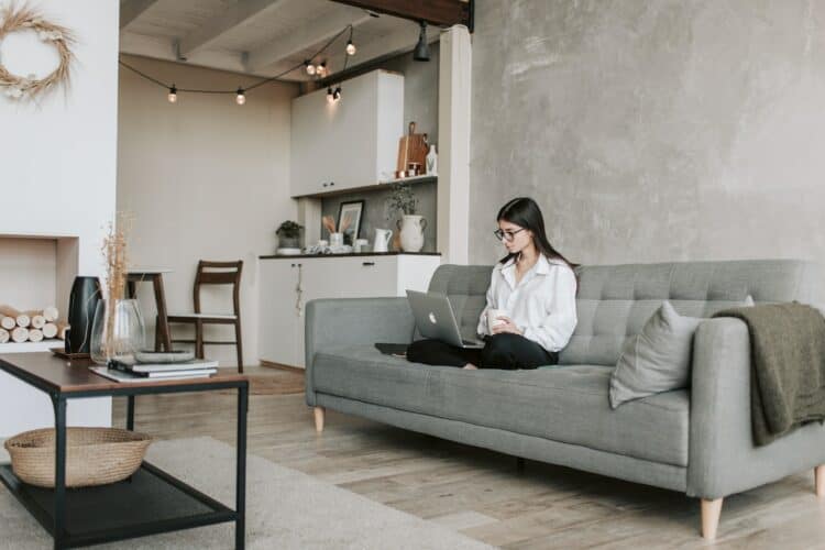 Photo by Vlada Karpovich: https://www.pexels.com/photo/woman-sitting-on-a-sofa-while-working-with-laptop-4050293/