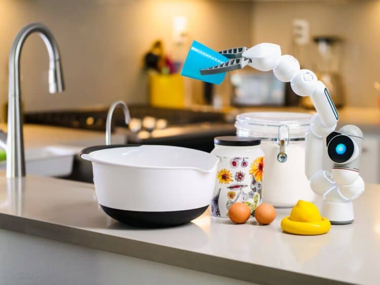 Photo by Kindel Media: https://www.pexels.com/photo/gray-and-white-robot-holding-plastic-cup-9028881/