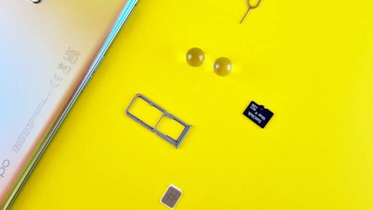 Photo by Andrey Matveev: https://www.pexels.com/photo/a-mobile-phone-with-sim-and-memory-card-on-yellow-surface-14434414/