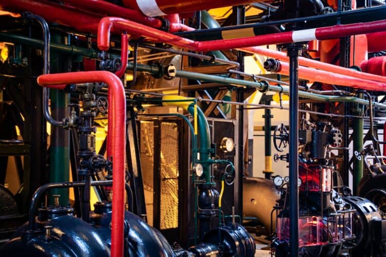 Photo by Magda Ehlers: https://www.pexels.com/photo/red-and-gray-industrial-machinery-2569842/