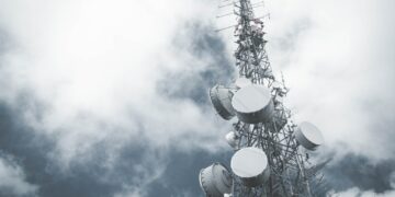 Photo by Aaditya Hirachan: https://www.pexels.com/photo/microwave-antennas-hanging-on-a-communication-tower-10259517/