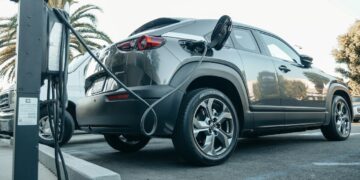 Photo by Kindel Media: https://www.pexels.com/photo/gray-electric-car-parked-on-a-charging-bay-9800006/