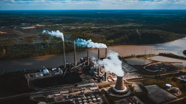 Photo by Kelly : https://www.pexels.com/photo/smoke-pipes-of-factory-in-city-4394341/