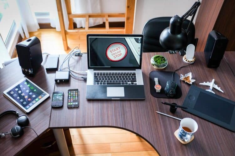 Photo by Pixabay: https://www.pexels.com/photo/black-and-white-laptop-computer-on-brown-wooden-desk-356056/