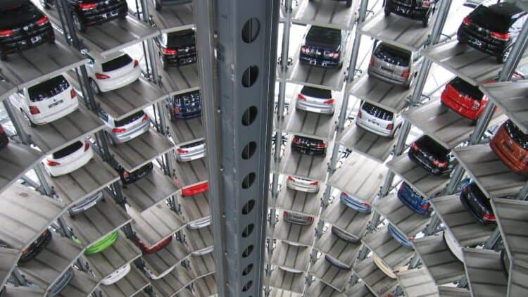 Photo by Pixabay: https://www.pexels.com/photo/vehicles-parked-inside-elevated-parking-lot-63294/