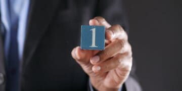 Photo by Towfiqu barbhuiya: https://www.pexels.com/photo/a-close-up-shot-of-a-person-holding-a-block-with-a-number-11501478/