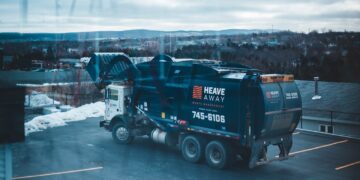 Photo by Erik Mclean: https://www.pexels.com/photo/garbage-truck-parked-in-parking-lot-11115607/