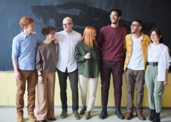 Photo by fauxels: https://www.pexels.com/photo/group-of-people-standing-beside-chalk-board-3184394/