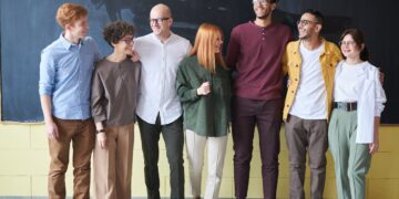 Photo by fauxels: https://www.pexels.com/photo/group-of-people-standing-beside-chalk-board-3184394/