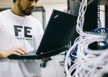 Photo by Field Engineer: https://www.pexels.com/photo/serious-ethnic-field-engineer-examining-hardware-and-working-on-laptop-442152/