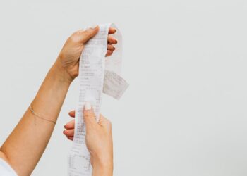 Photo by Karolina Kaboompics: https://www.pexels.com/photo/woman-holding-a-receipt-4959907/