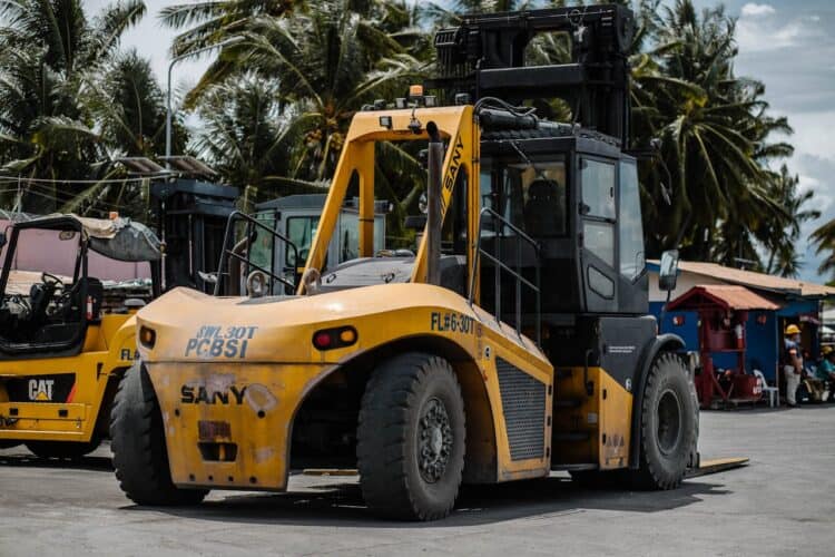 Photo by Denniz Futalan: https://www.pexels.com/photo/parked-yellow-forklift-truck-2523921/