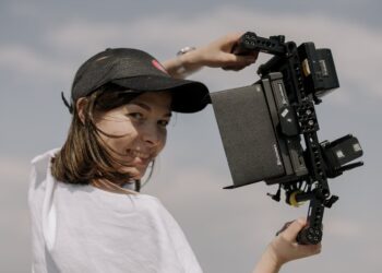 Photo by cottonbro studio: https://www.pexels.com/photo/brunette-woman-recording-video-with-camera-5265828/