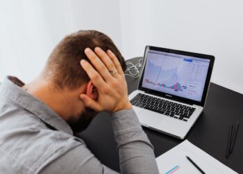 Photo by Karolina Kaboompics: https://www.pexels.com/photo/man-with-laptop-on-desk-terrified-by-stock-market-chart-5717791/