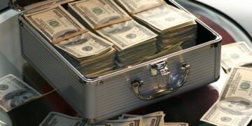 Photo by Pixabay: https://www.pexels.com/photo/hard-cash-on-a-briefcase-259027/