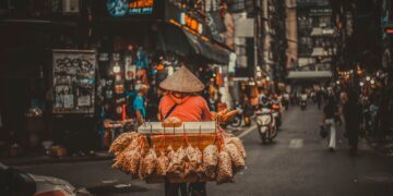 Photo by Sheep .: https://www.pexels.com/photo/photo-of-a-person-selling-snack-on-a-bicycle-2532098/
