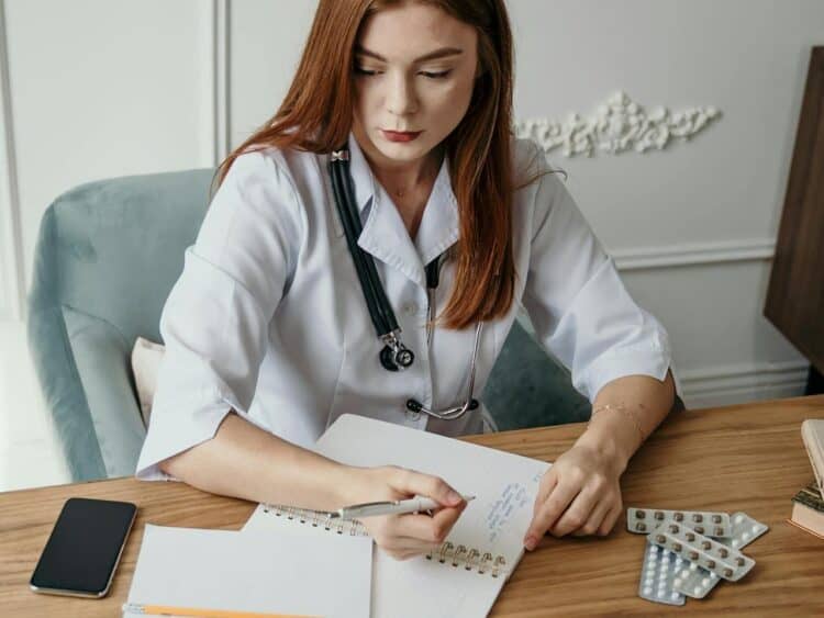 Photo by Tima Miroshnichenko: https://www.pexels.com/photo/photo-of-woman-writing-on-a-desk-5407206/