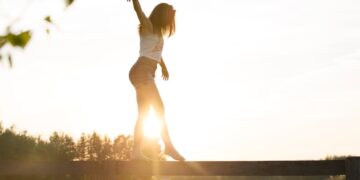 Photo by Sebastian V.: https://www.pexels.com/photo/woman-walking-on-fence-1548769/