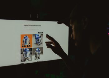 Photo by Alberlan  Barros: https://www.pexels.com/photo/man-hand-over-robot-on-screen-16018142/