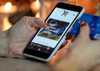 Photo by AS Photography: https://www.pexels.com/photo/person-using-black-and-white-smartphone-and-holding-blue-card-230544/