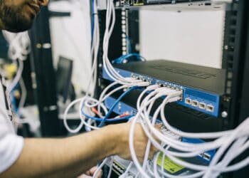 Photo by Field Engineer: https://www.pexels.com/photo/electronics-engineer-fixing-cables-on-server-442150/