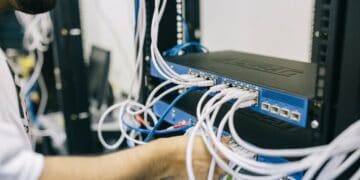 Photo by Field Engineer: https://www.pexels.com/photo/electronics-engineer-fixing-cables-on-server-442150/