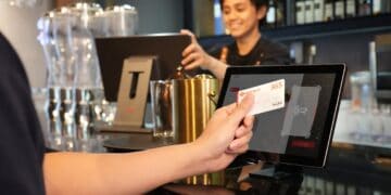 Photo by iMin Technology: https://www.pexels.com/photo/a-close-up-shot-of-a-person-having-a-card-payment-12935071/
