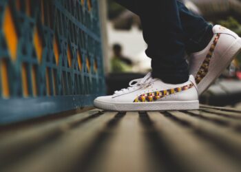 Photo by Suraj B: https://www.pexels.com/photo/selective-focus-photo-of-person-wearing-puma-shoes-2759785/