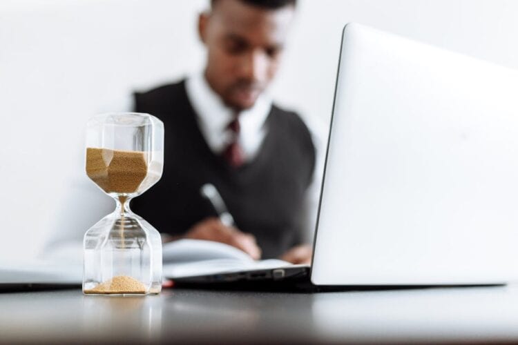 Photo by Thirdman  : https://www.pexels.com/photo/man-in-black-suit-jacket-sitting-beside-table-with-macbook-pro-5060979/
