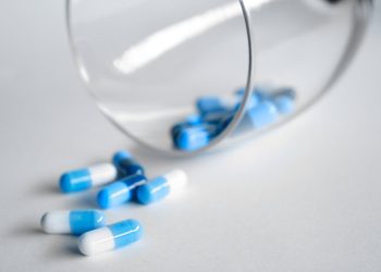 Photo by Pietro Jeng: https://www.pexels.com/photo/depth-photography-of-blue-and-white-medication-pill-360622/