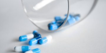 Photo by Pietro Jeng: https://www.pexels.com/photo/depth-photography-of-blue-and-white-medication-pill-360622/