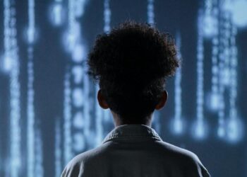 Photo by Ron Lach : https://www.pexels.com/photo/back-view-of-a-teen-boy-with-a-digital-background-9783350/