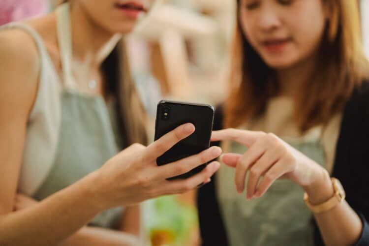 Photo by Amina Filkins: https://www.pexels.com/photo/crop-women-with-modern-smartphone-in-shop-5410102/