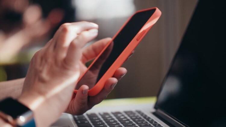 Photo by Kindel Media: https://www.pexels.com/photo/a-person-holding-a-smartphone-7054530/