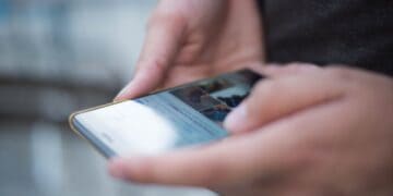 Photo by thomas vanhaecht: https://www.pexels.com/photo/person-using-smartphone-shallow-focus-photography-215367/