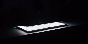 Photo by Daniel Putzer: https://www.pexels.com/photo/photography-of-macbook-half-opened-on-white-wooden-surface-633409/