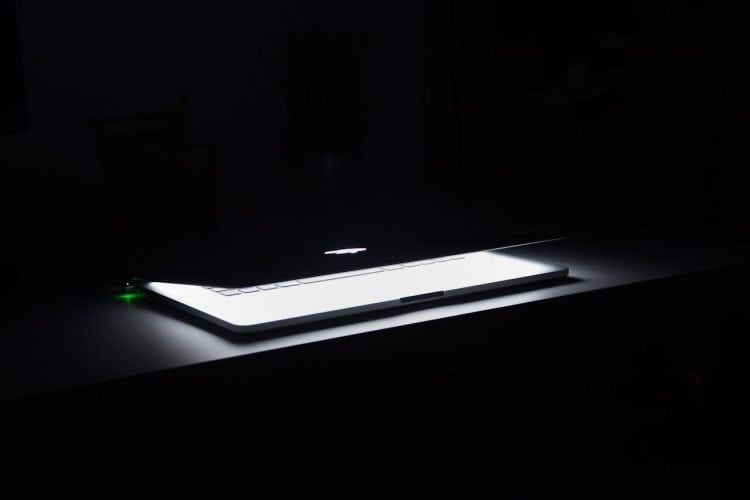Photo by Daniel Putzer: https://www.pexels.com/photo/photography-of-macbook-half-opened-on-white-wooden-surface-633409/