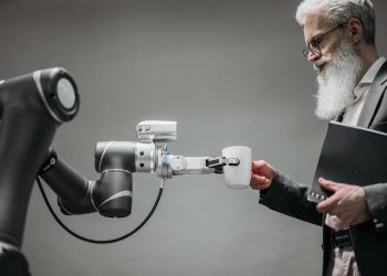 Photo by Pavel Danilyuk: https://www.pexels.com/photo/a-robot-holding-a-cup-8439093/